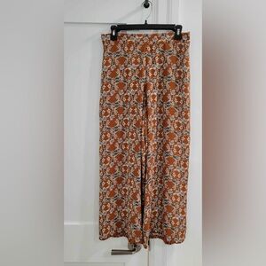 Max Studio burnt orange cropped palazzo pants w/ floral pattern (read)